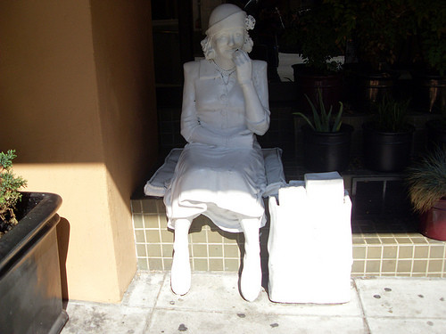 Sitting shopper statue in San Francisco Sitting shopper statue