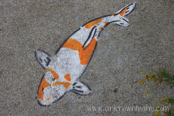 Painted fish on sidewalk
