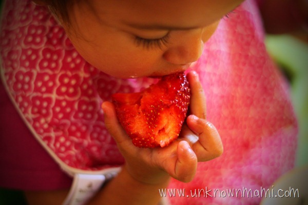 Baby-eating-strawberry