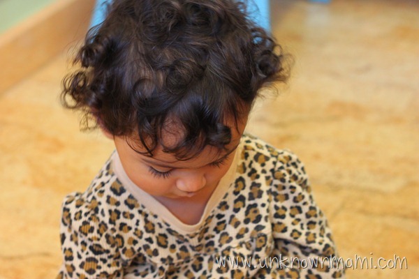 Curly haired baby