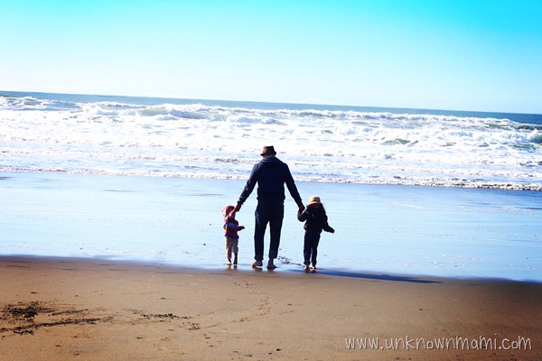 Father-and-daughters-on-the-beach