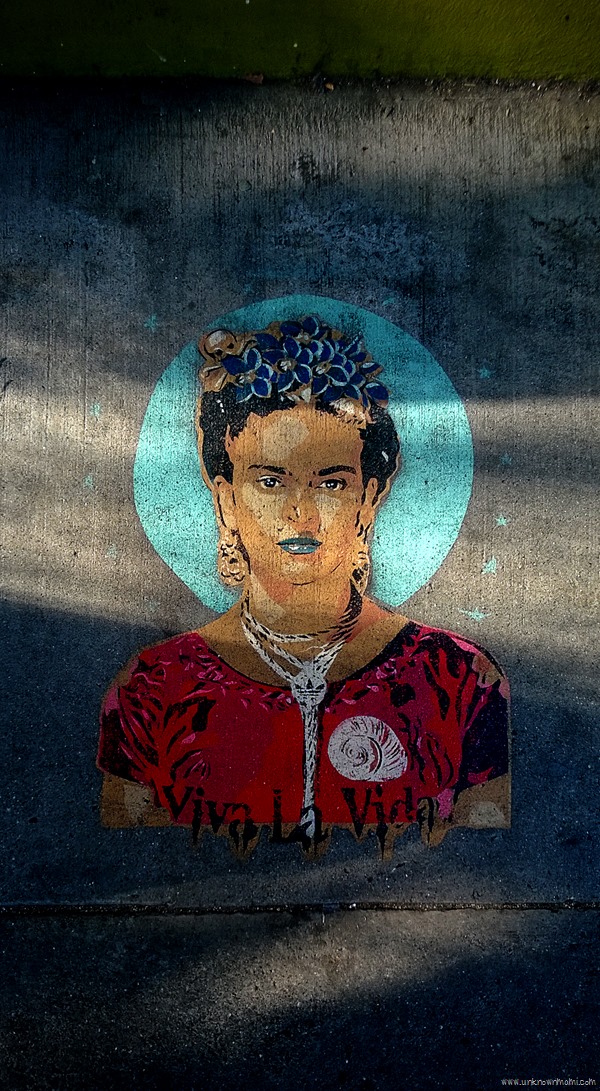 Frida Kahlo on the sidewalk of the Mission