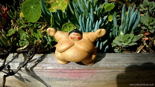 Sumo wrestler figurine