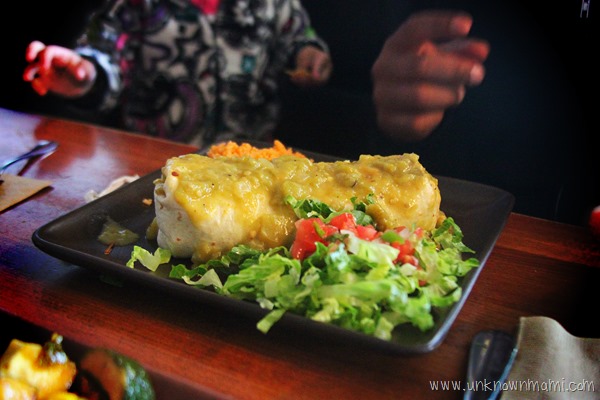 Burrito with green salsa at Green Chile Kitchen