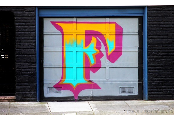 F painted on garage door in San Francisco