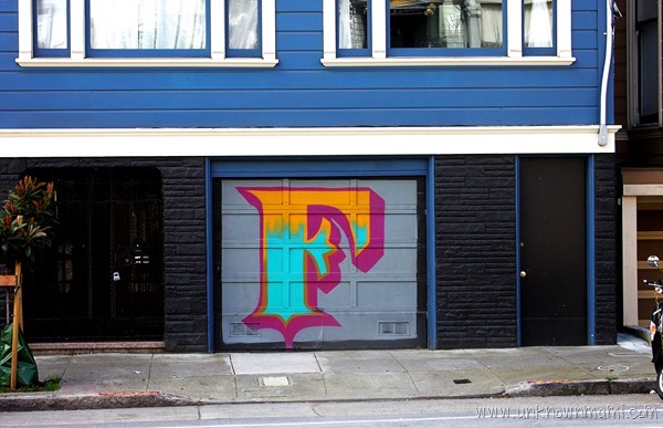 Garage door with an F painted on it
