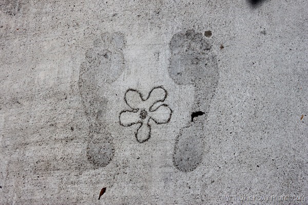 Footprints on the sidewalk