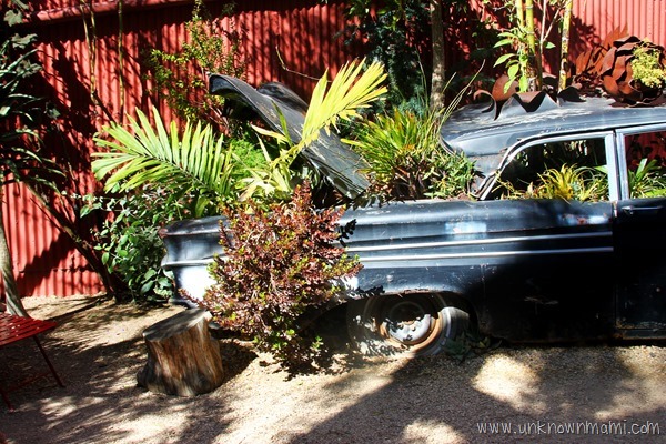 Car used as planter at Flora Grubb