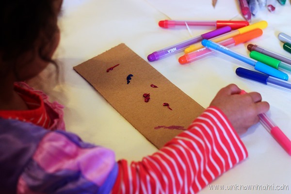 Kid making art