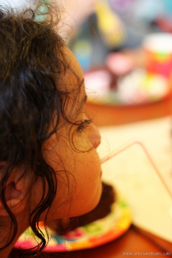 Child drinking from a straw
