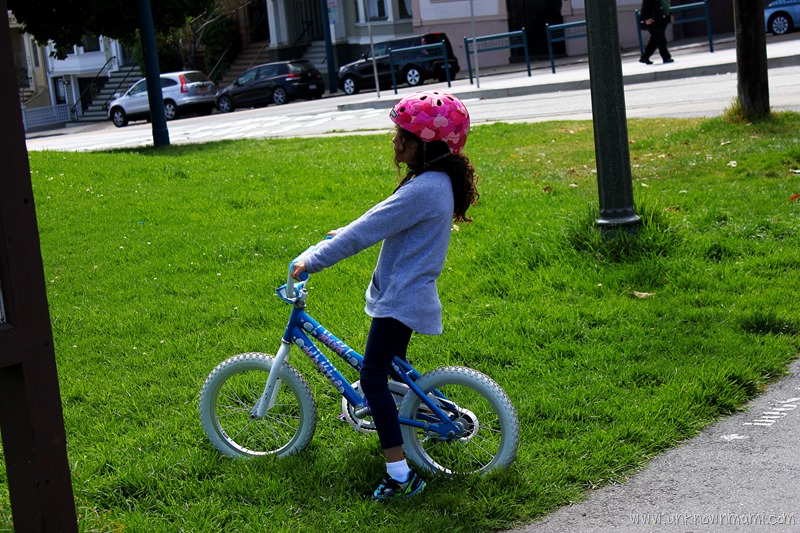 Little girl riding bike in San Francisco