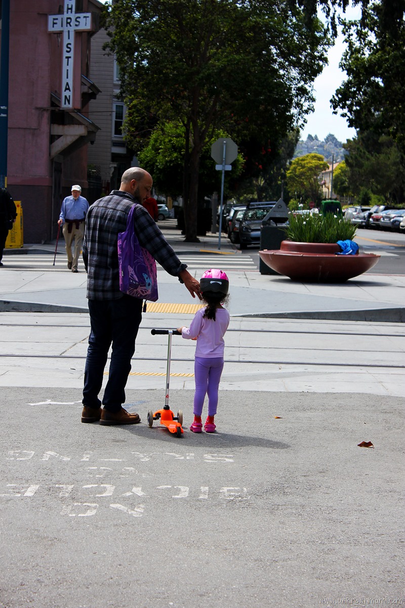 little girl with scooter