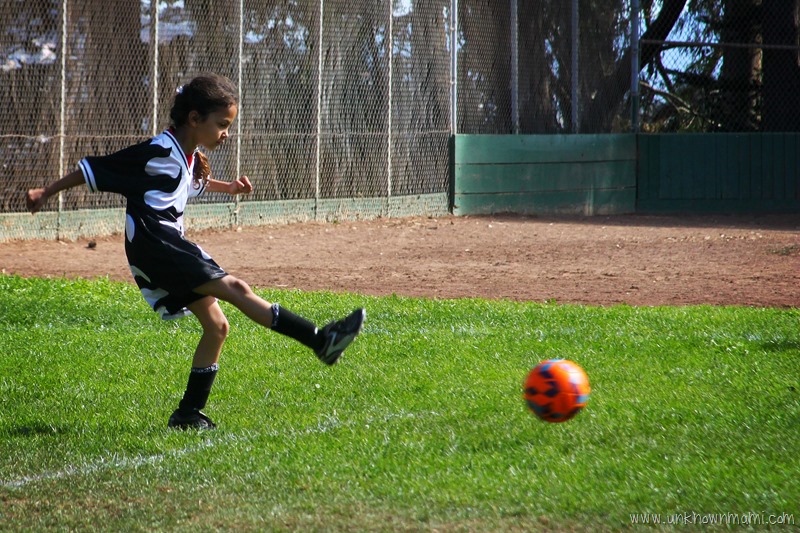 Playing soccer