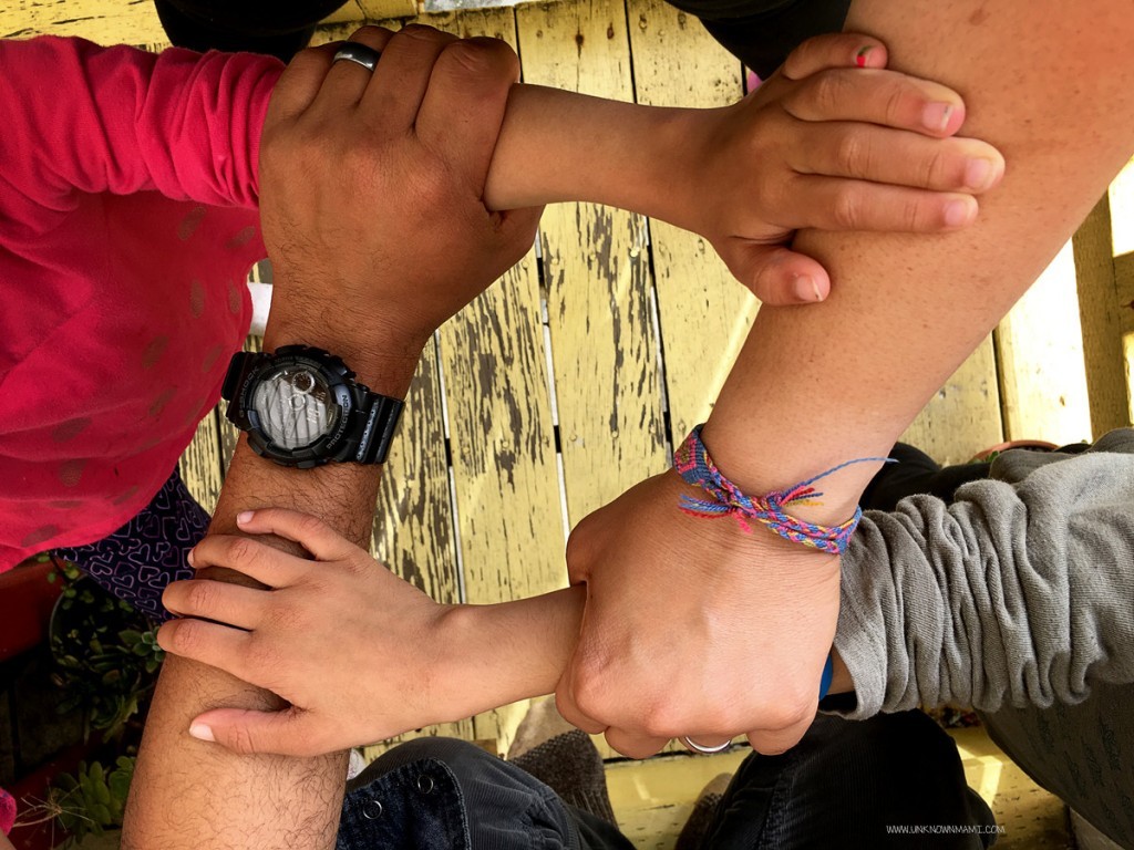 four arms interlocking