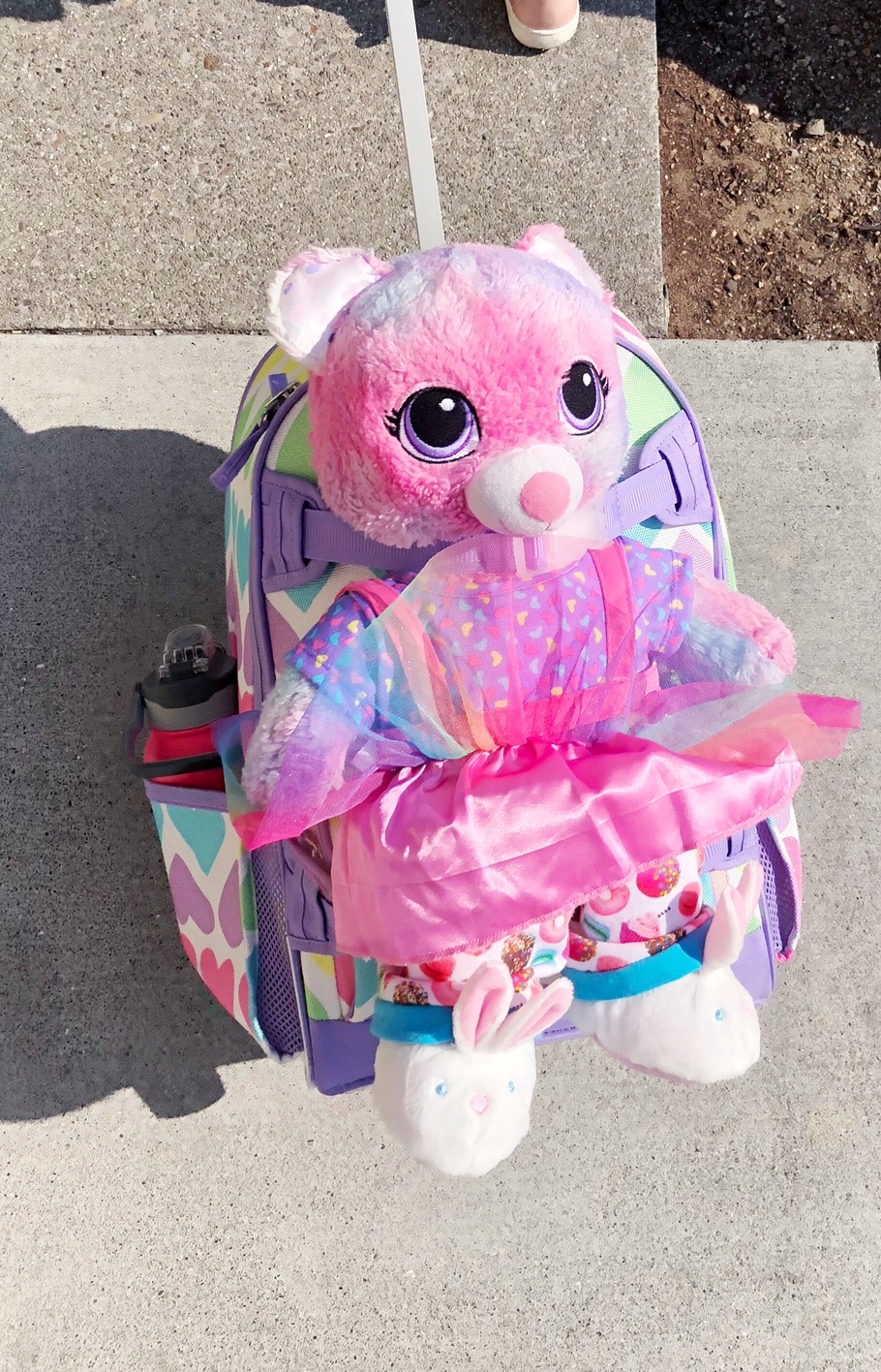 backpack with teddy bear