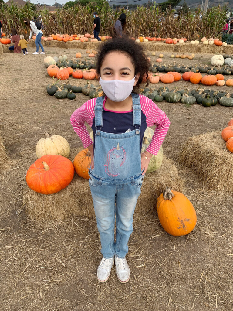 little girls at pumpkin farm