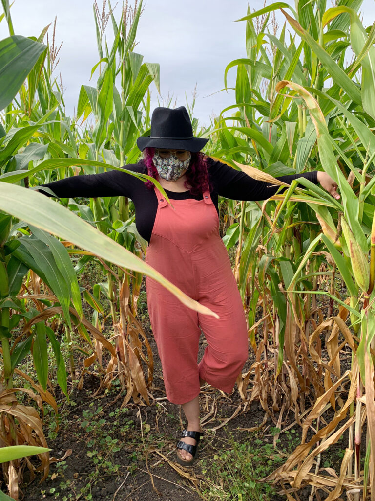 pretending to be a scarecrow