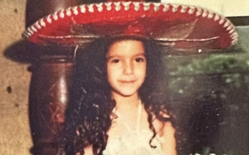 Little girl wearing a mariachi sombrero